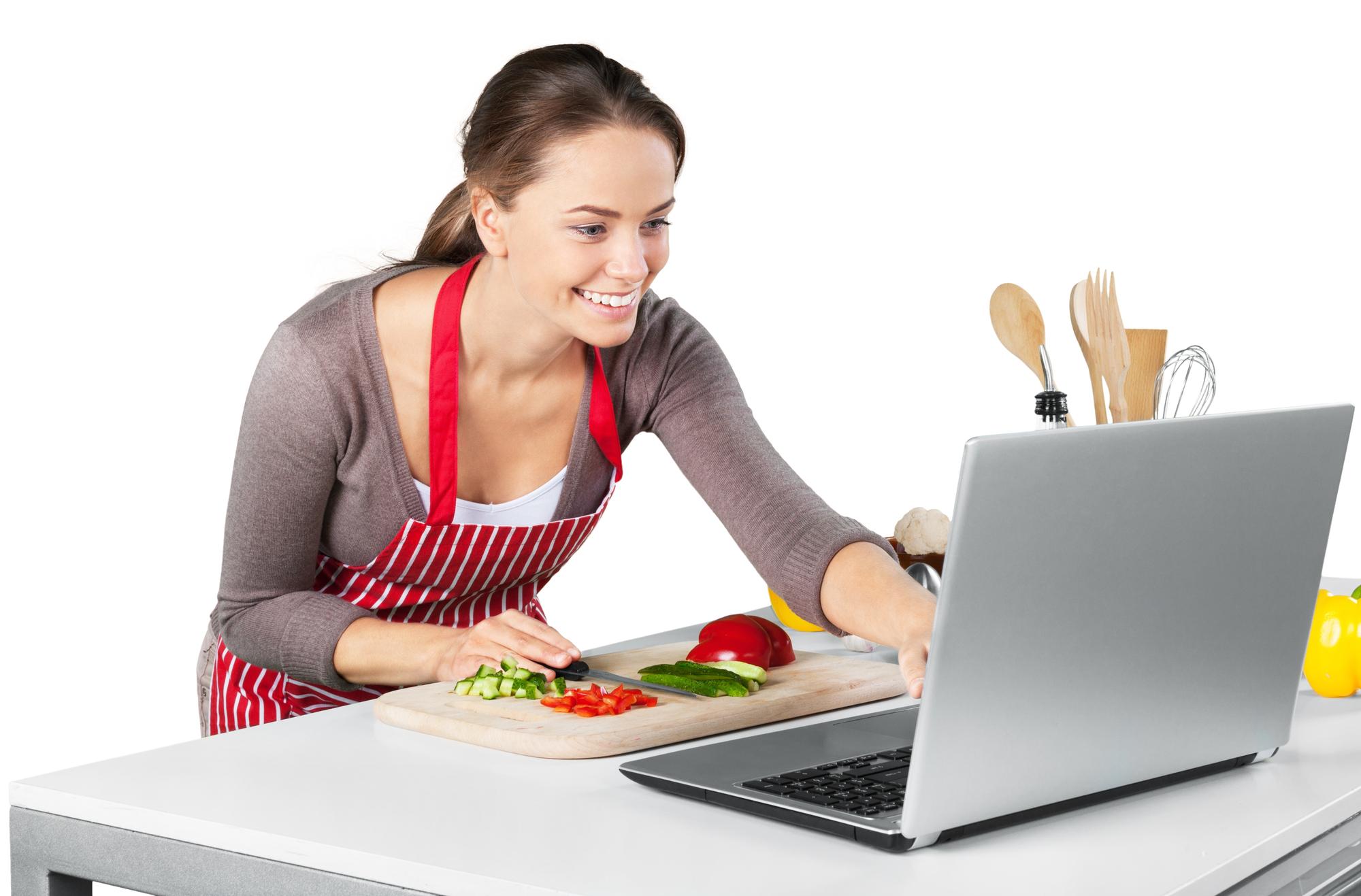 Student cooking along in a cozy kitchen during an online session
